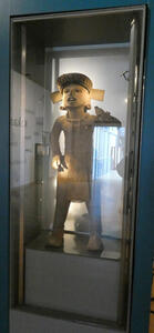 large mesoamerican sculpture of man