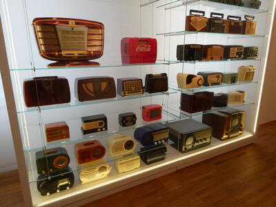 display case with many radios