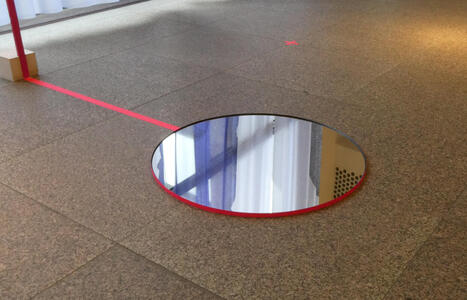 round mirror on floor