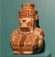 Animal figure with geometric forms on hat