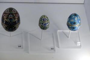 Three ornate Fabergé eggs