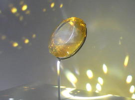 Elliptical yellow crystal