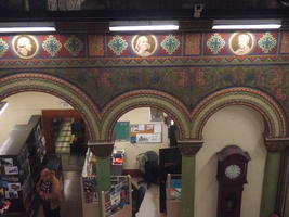 Floral-style paintwork on arches above mathematics library