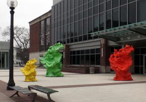 Yellow, green, and red sculptures that look like lumps of Play-Doh (TM)
