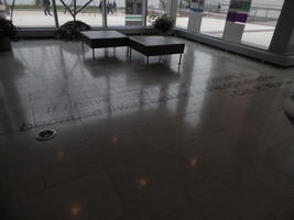 Words inlaid on floor: If I have seen further than others, it is because I was looking in the right direction - Carl R. Woese