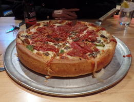 Deep dish pizza; 11 inches diameter, 2.5 inches thick