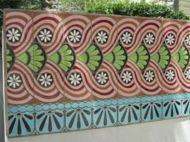 Tiled wall with curved geometric forms