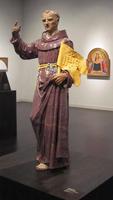 Italian saint in purple monk's robe