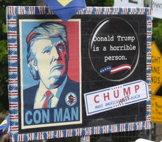 Trump w. slogan “Con Man”; button “Donald Trump is a horrible person”; bumper sticker: CHUMP - Make America Hate Again