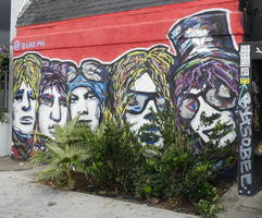 Wall painting of five people (rock musicians?)