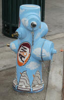 Hydrant painted with A&W restaurant logo and picturs of ic cream floats