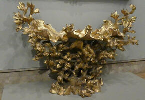 Gold side table with leaf/tree design