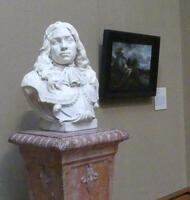 Bust of man with long flowing hair