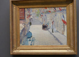 Painting of street lined with flags; man with one leg on crutches in foreground