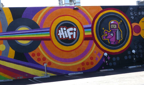 Right half of mural; HiFi (Historic FilipinoTown) as text, person in space suit at right