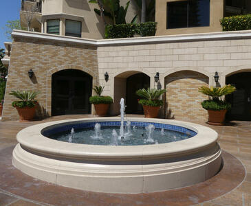Circular fountain in courtyard of hotel