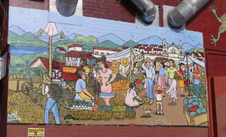 Outdoor market scene painted on wall