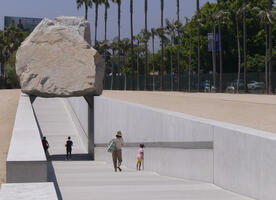 Walkway passing under 340-ton boulder