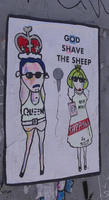 Poster on wall: “God save the sheep” with a freddy mercury drawing in a crown