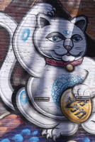 wall painting of daruma cat