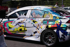 Car with character from “Racing Miku“ on side