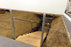 Stairs leading down to area excavated under the floor of museum