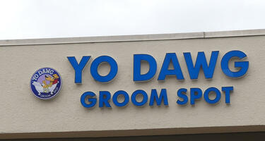 Sign for a pet grooming business: YO DAWG / GROOM SPOT