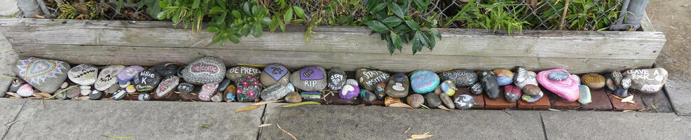 Stones with text like STAY STRONG, STAY POSITIVE, BE YOURSELF