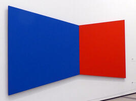 Red and blue trapezoids giving a three-d effect where they join