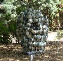 Sculpture made of what appear to be large green marbles