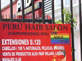 Hair salon advertising “She Male Style”