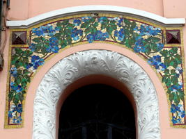 flower and vine mosaic over an archway