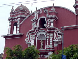 Long view of top part of pink church