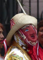 Masked man in traditional peruvian costume