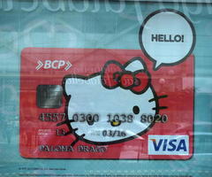 Poster of red credit card with “hello kitty”