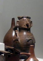 Vessels in form of cat and owls