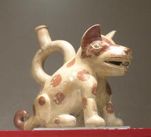 Vessel in form of spotted dog