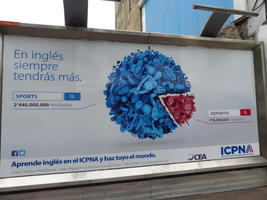Billboard showing pie chart of results for English vs. spanish search for sports.
