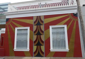 red and gold geometric design on front of building