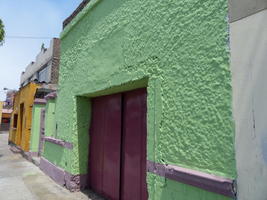 lime green and purple stucco building