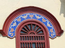 Mosaic atop arched window