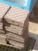 stack of paving bricks with diamond pattern