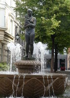 Fountain with sculpture of woman holding infant