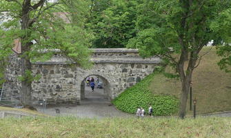 Stone archway and hill
