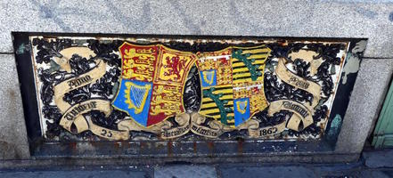 Heraldic shields at base of bridge column