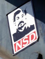 Sticker showing shocked man with moustache; labeled NSD