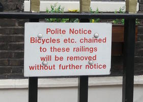 Polite notice: Bicycles etc. chained to these railings will be removed without further notice