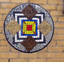 Circular mosaic with geometric shapes