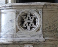 Marble carving of interlocked V and A
