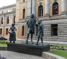 Statues of three actors